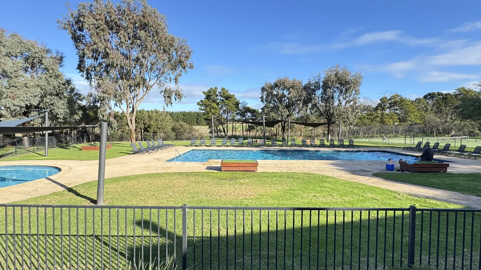 Outdoor swimming pools and lawns at The Nature Resort