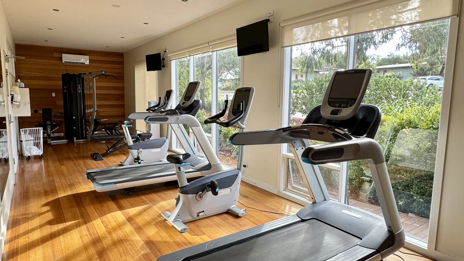 Cardio equipment inside the resort gymnasium